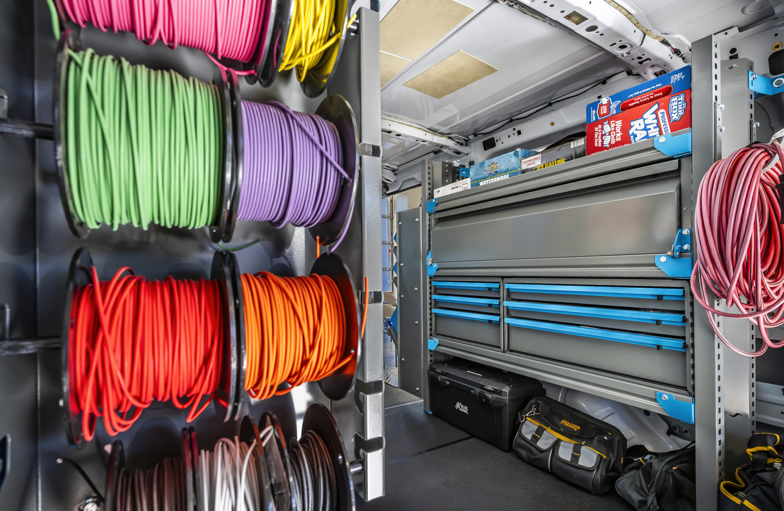 photo of the inside of a work van with wire and cable organization system