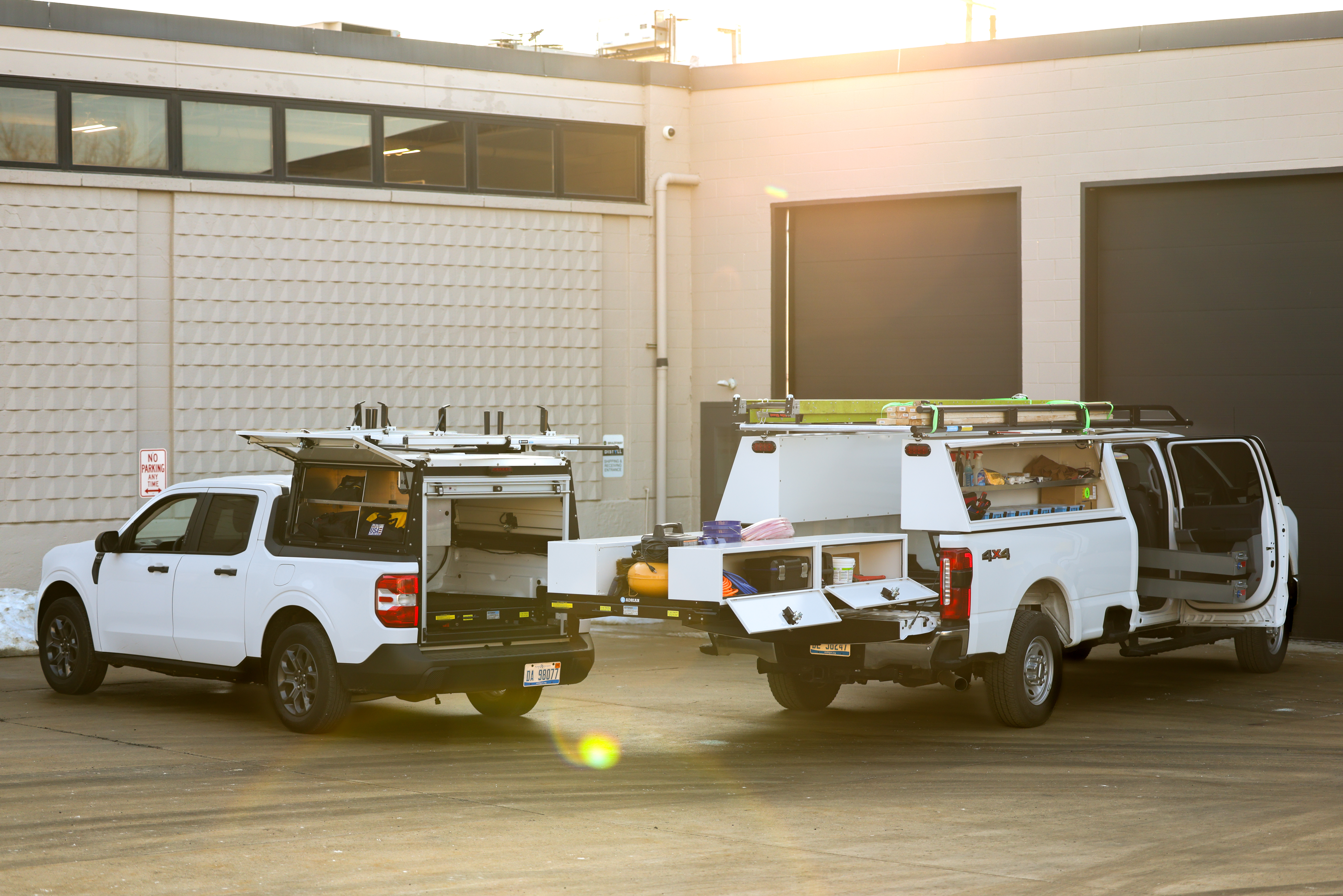 Adrian open-bed service truck system and roll-up door options.